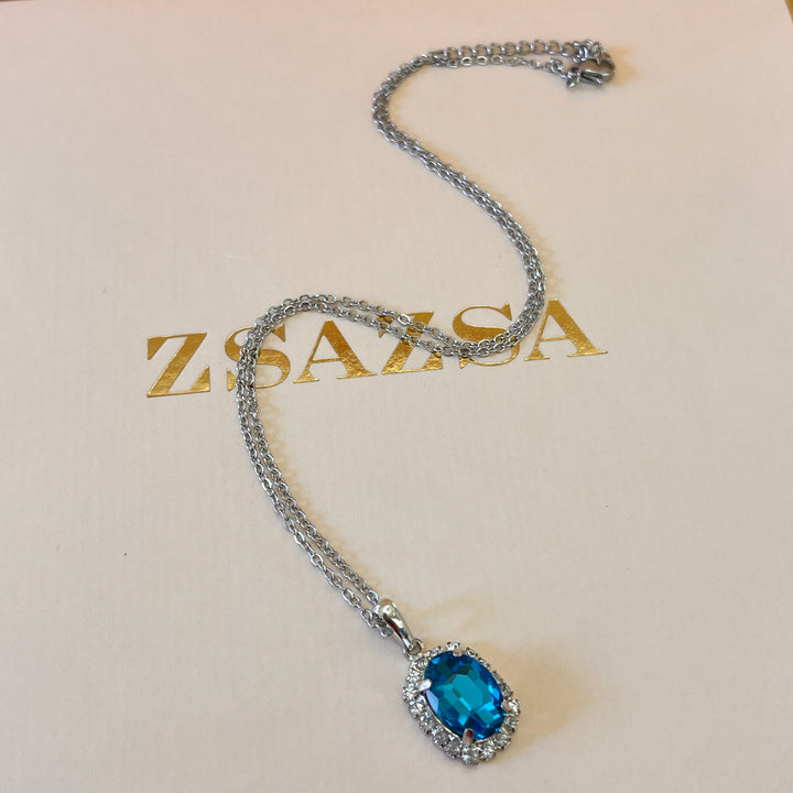 Turquoise oval preciosa crystals set