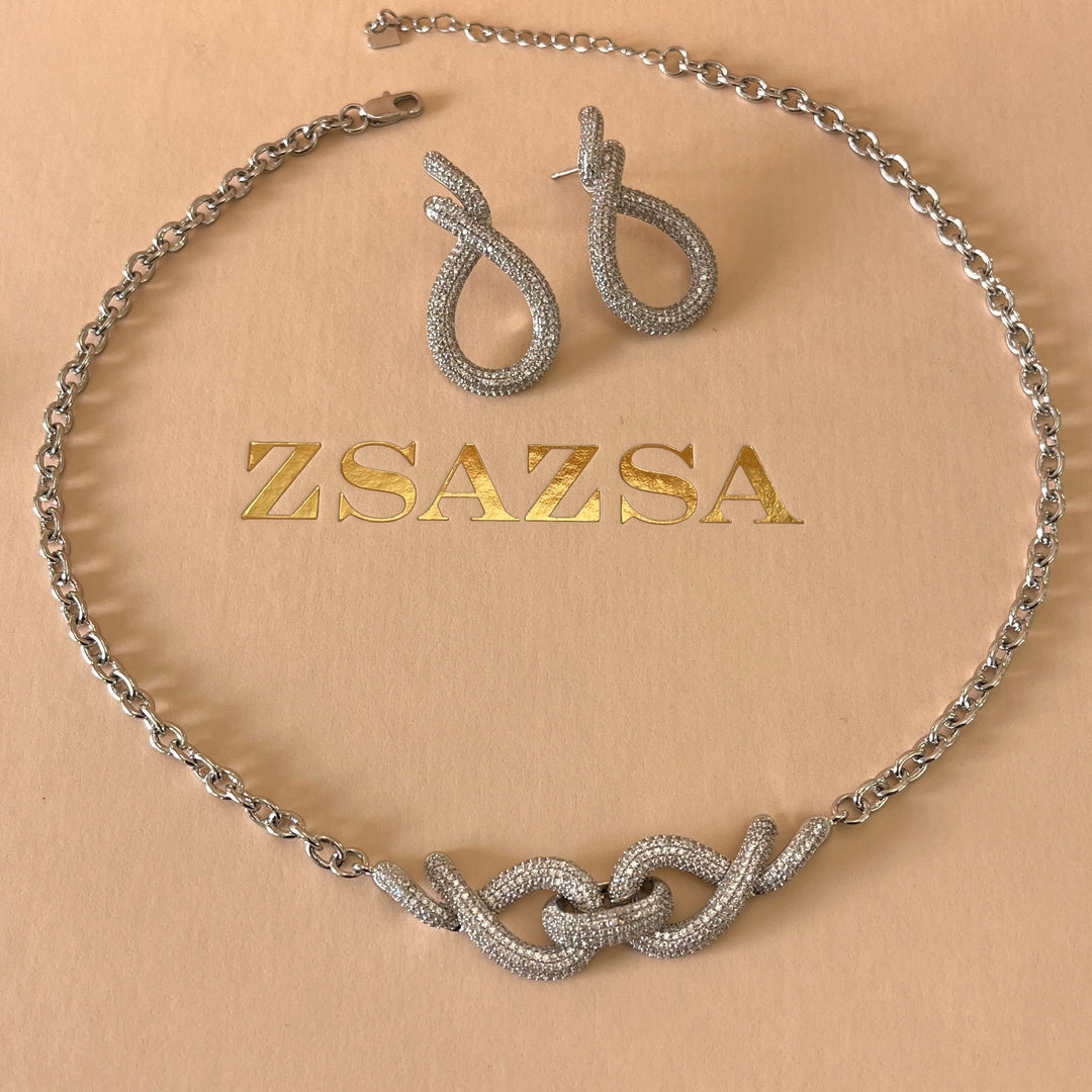 Silver zircone twisted set