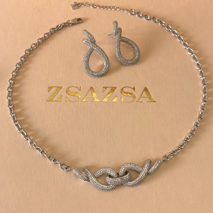 Silver zircone twisted set