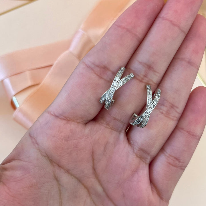 Silver zircone crossed half hoops