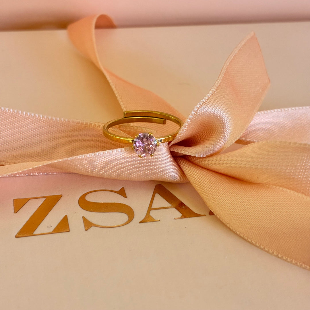 Solitaire light pink gold plated ring