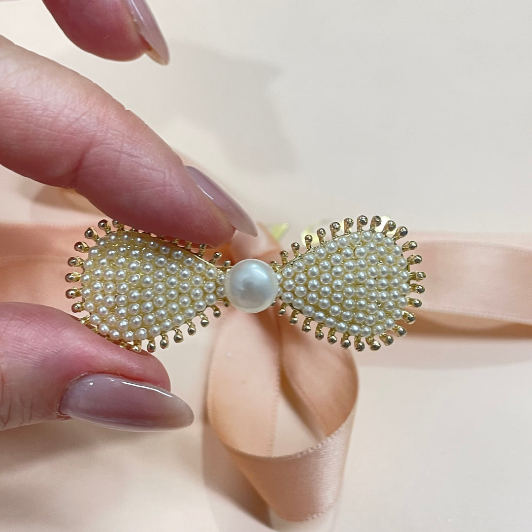 Bow pearl hair clip