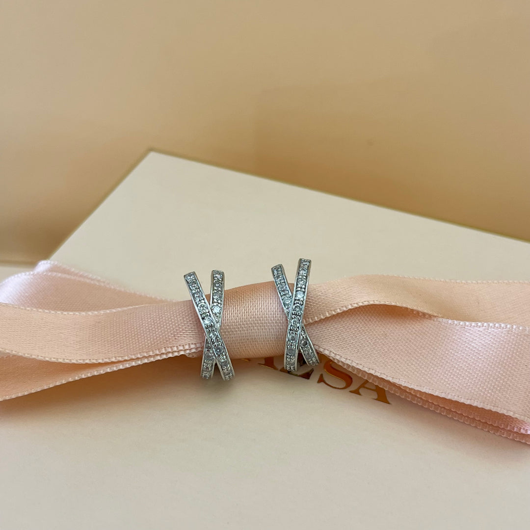 Silver zircone crossed half hoops