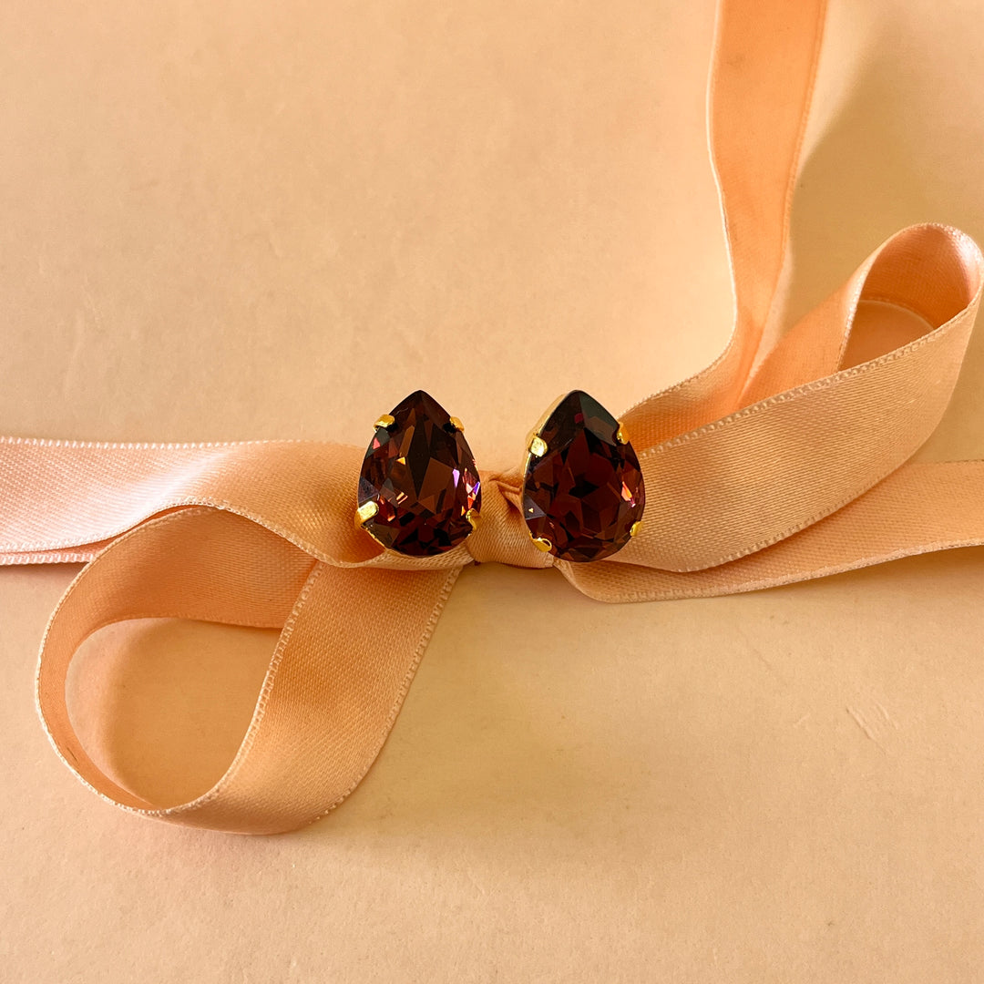 Purple teardrop preciosa crystals set