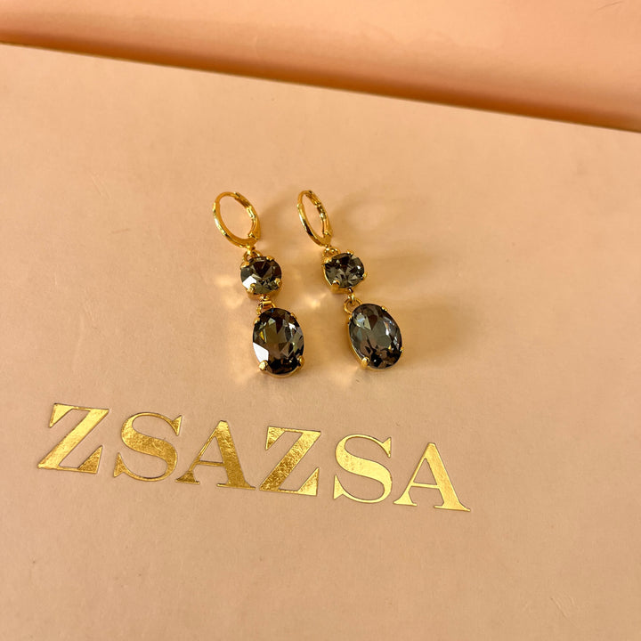 Grey oval and round preciosa crystals set