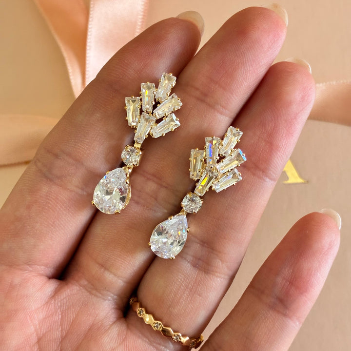 Baguette and teardrop zircone gold plated earrings