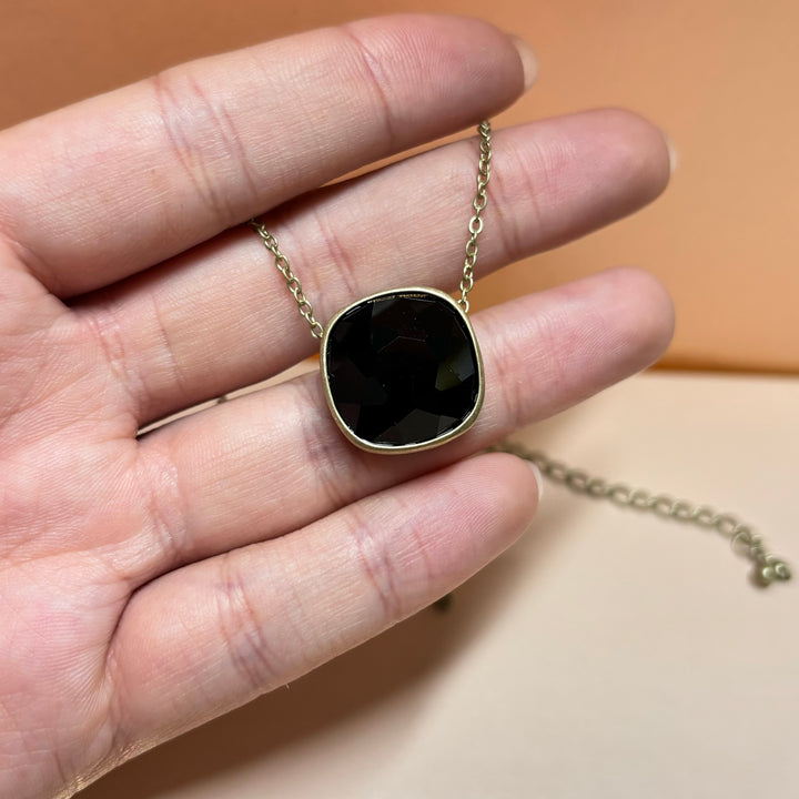 Black rhinestone gold pendant