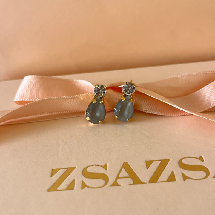 Light grey teardrop preciosa crystals studs