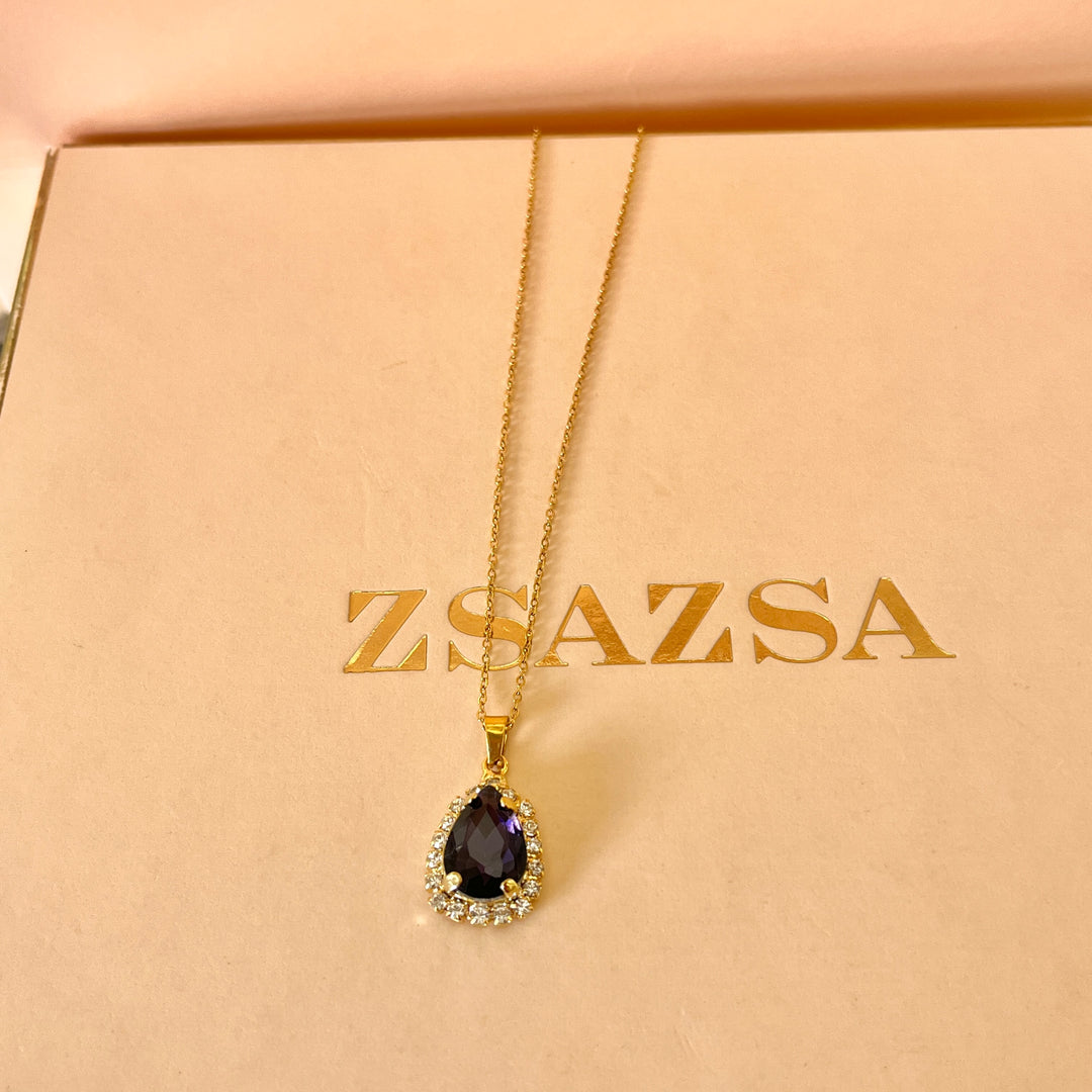 Purple teardrop preciosa crystals set