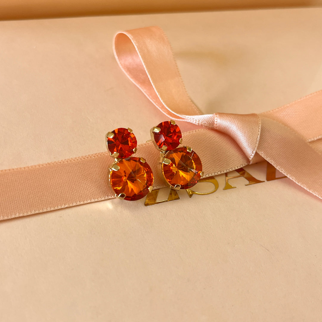 Orange Swarovski crystals studs
