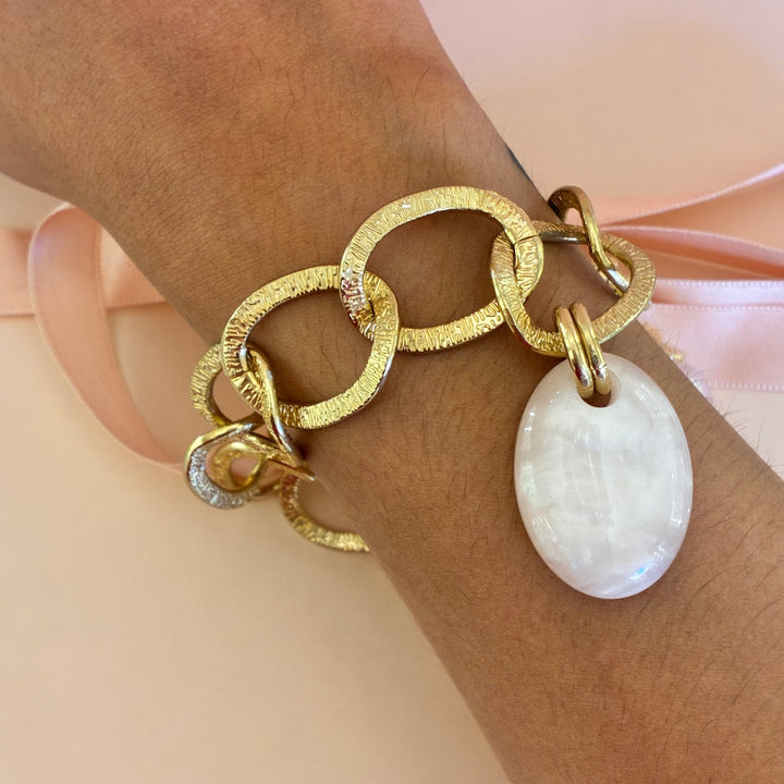 Gold plated light pink bracelet