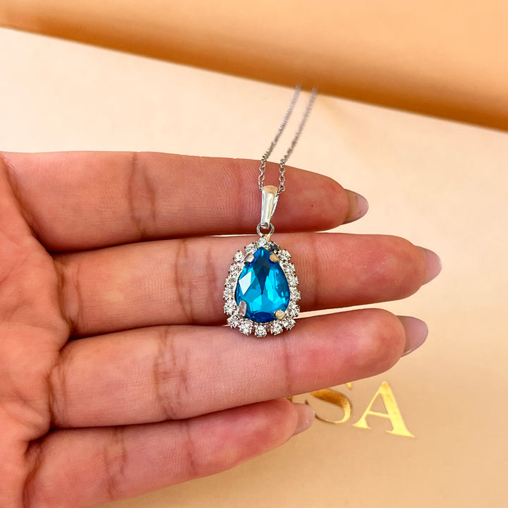 Turquoise teardrop preciosa crystals set