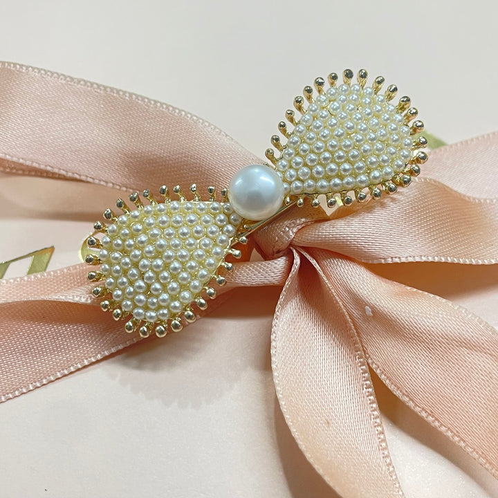 Bow pearl hair clip
