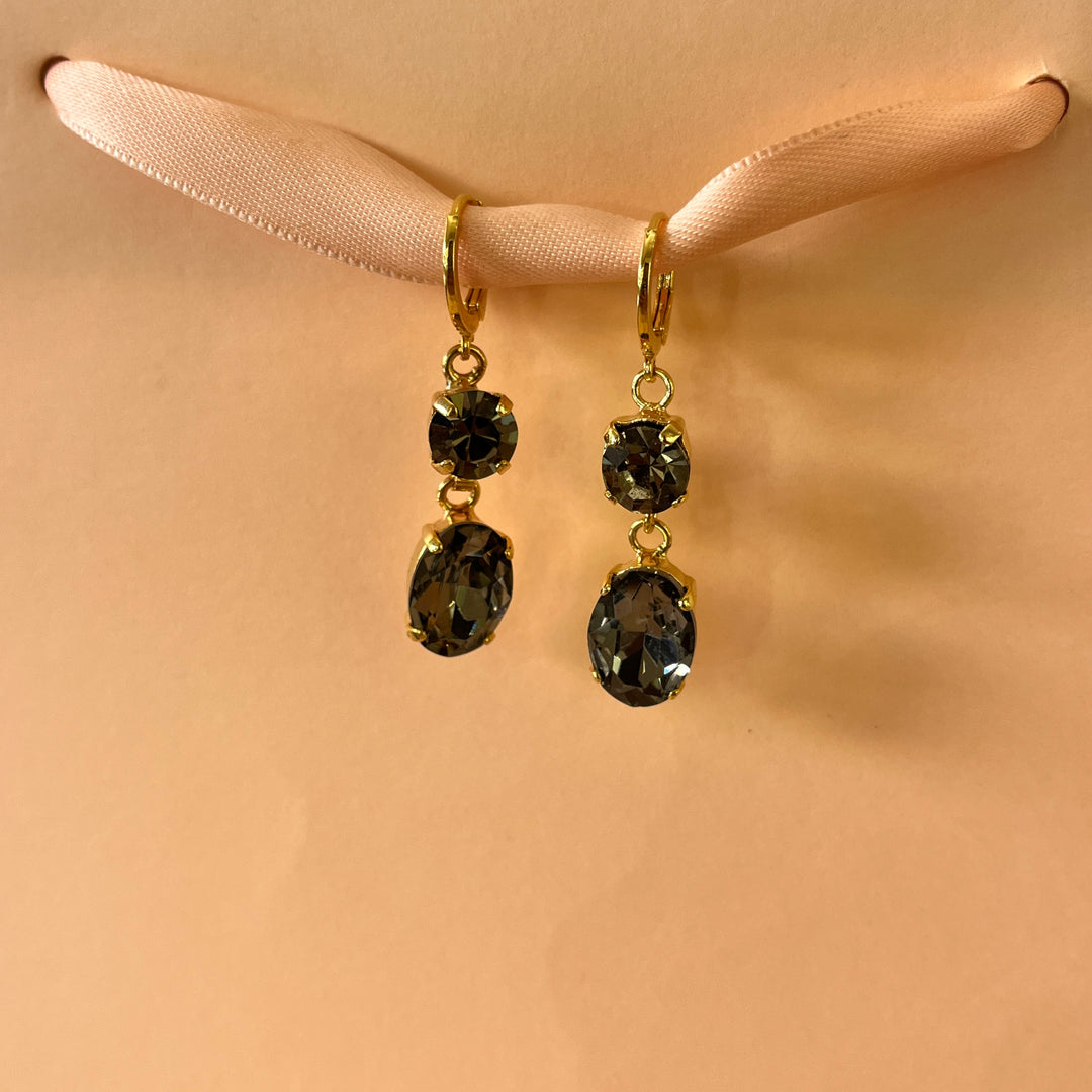 Grey oval and round preciosa crystals set