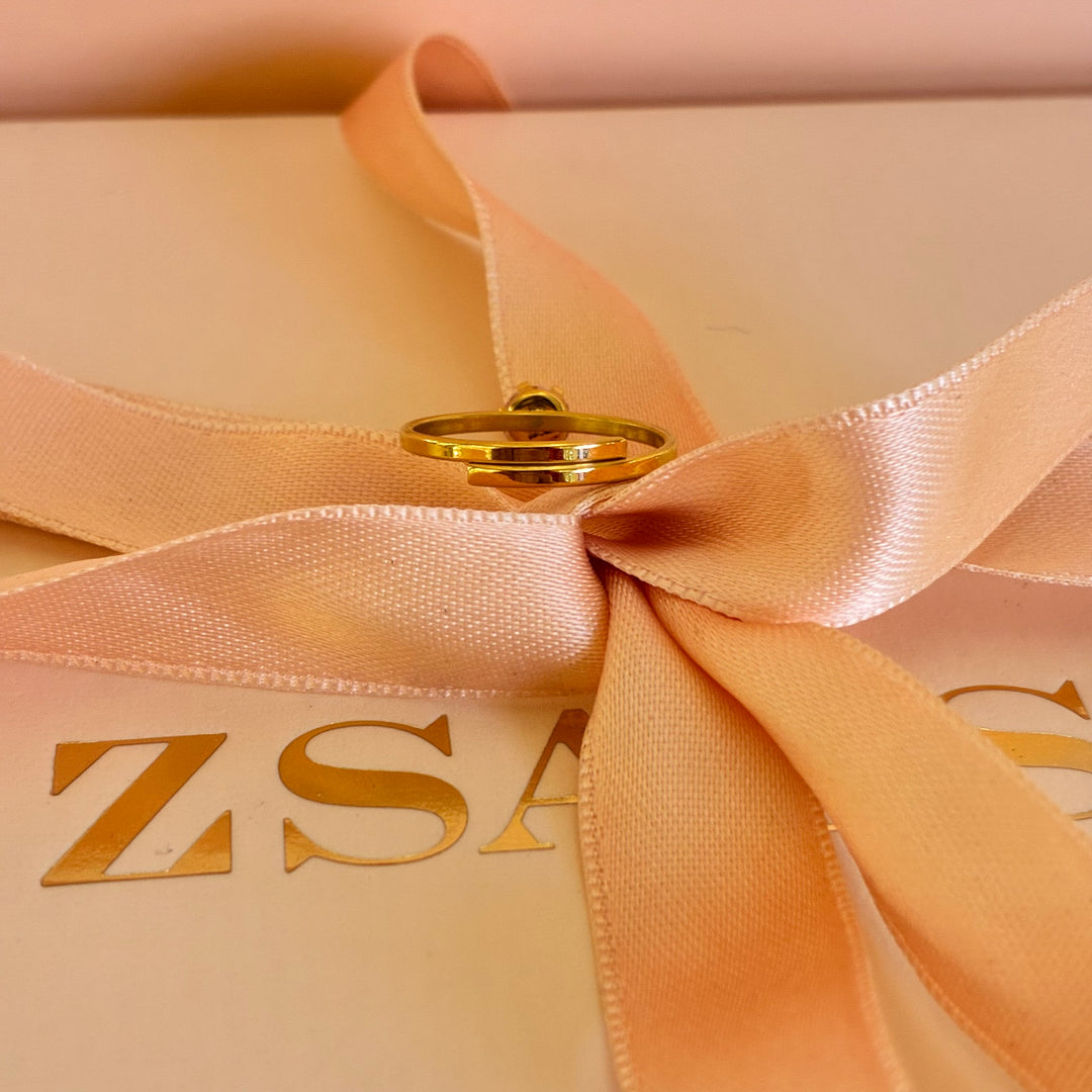 Solitaire light pink gold plated ring