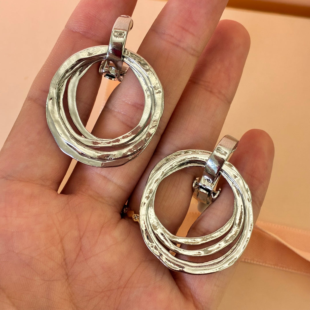 Dangle round clip on earrings