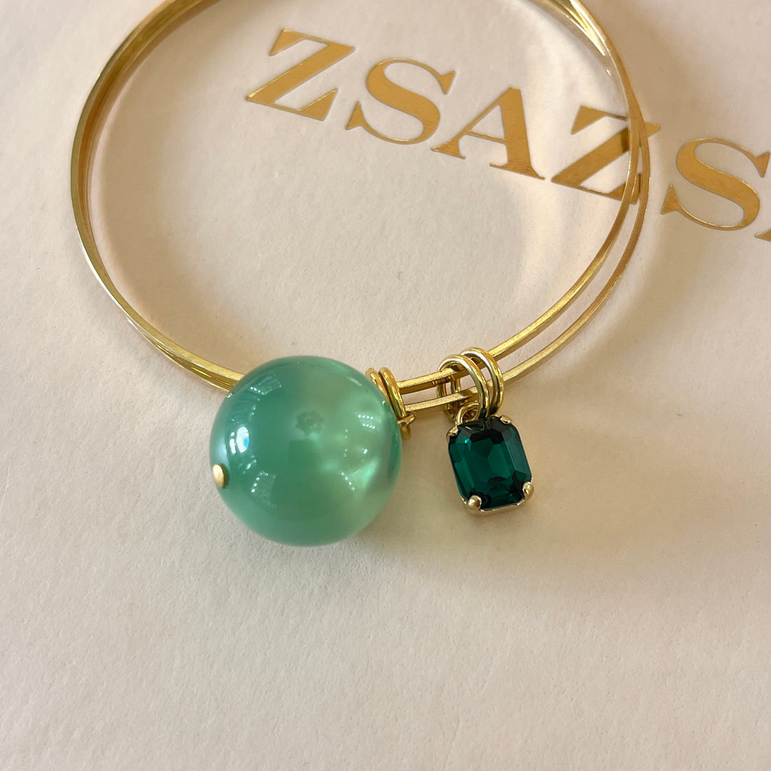 Dark green Swarovski crystal bangle with light green ball