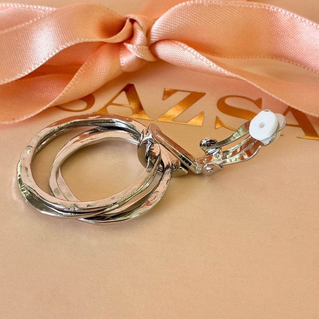 Dangle round clip on earrings