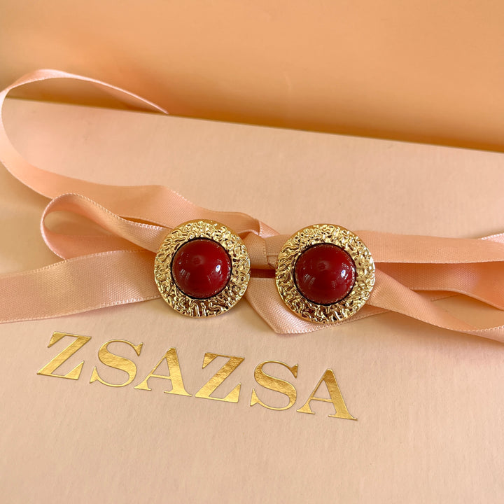 Dark red resin studs