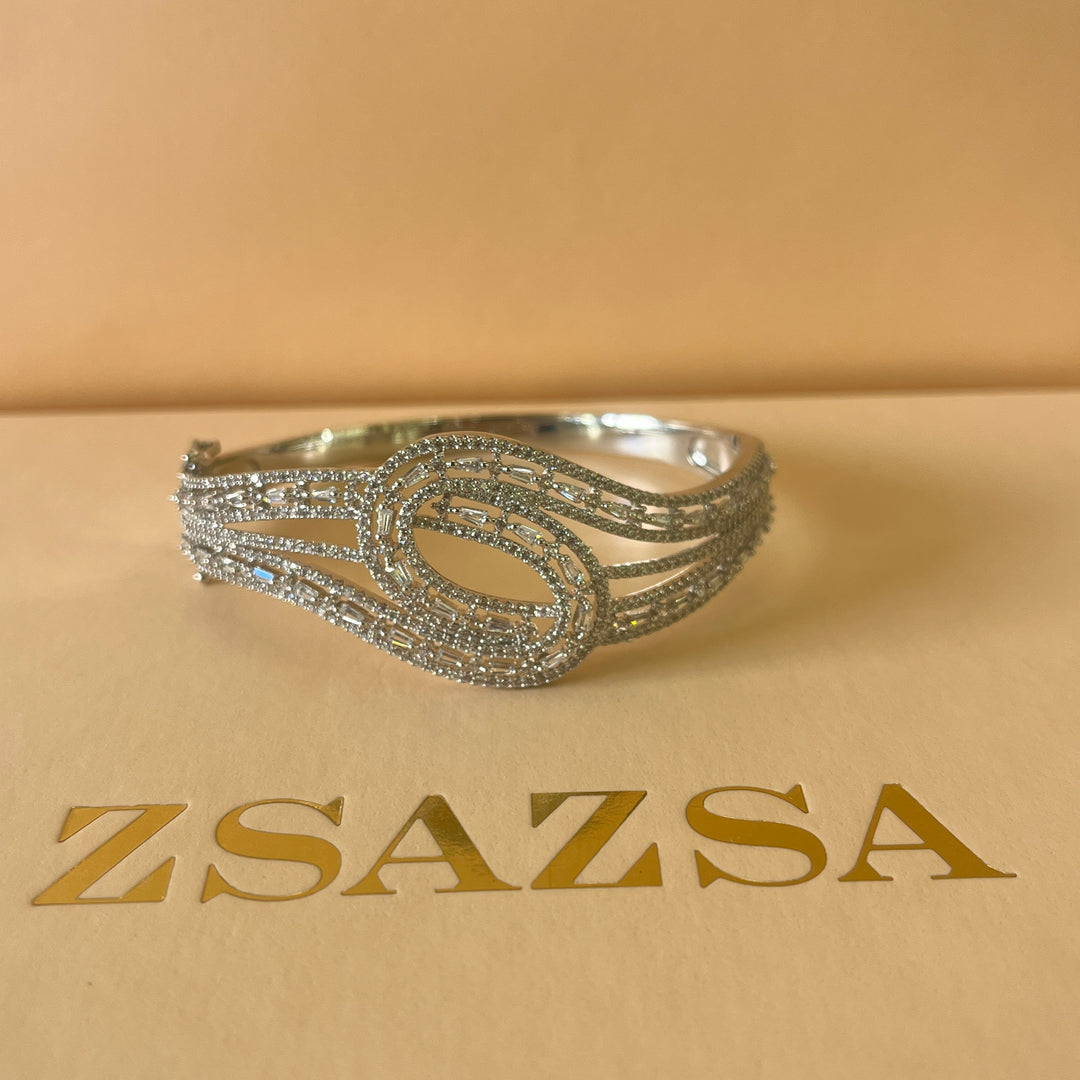 Crossed silver zircone bangle
