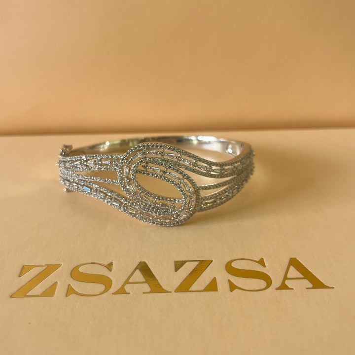 Crossed silver zircone bangle