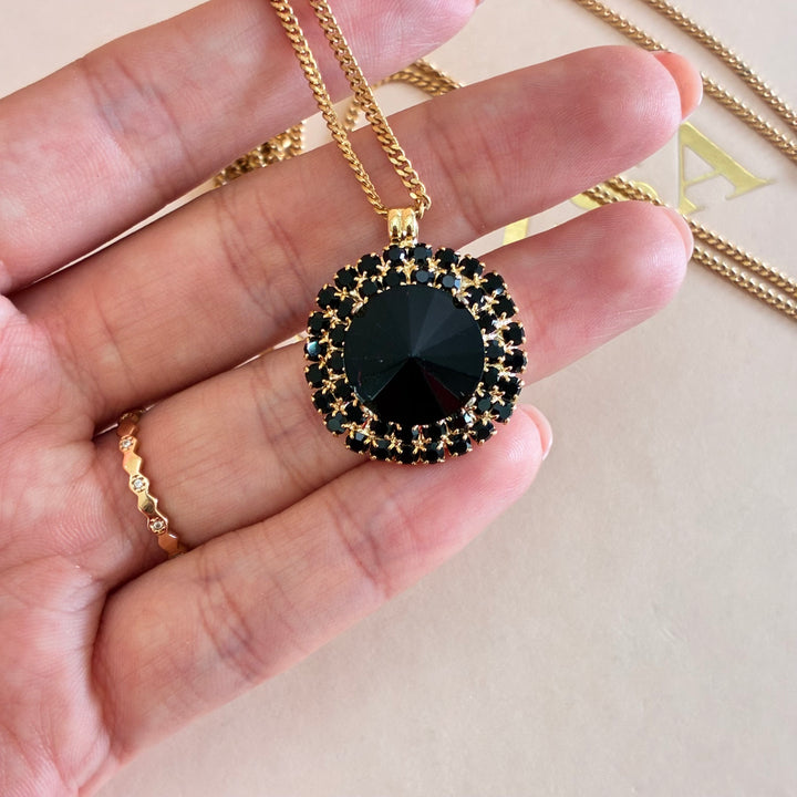 Round black gold plates pendant