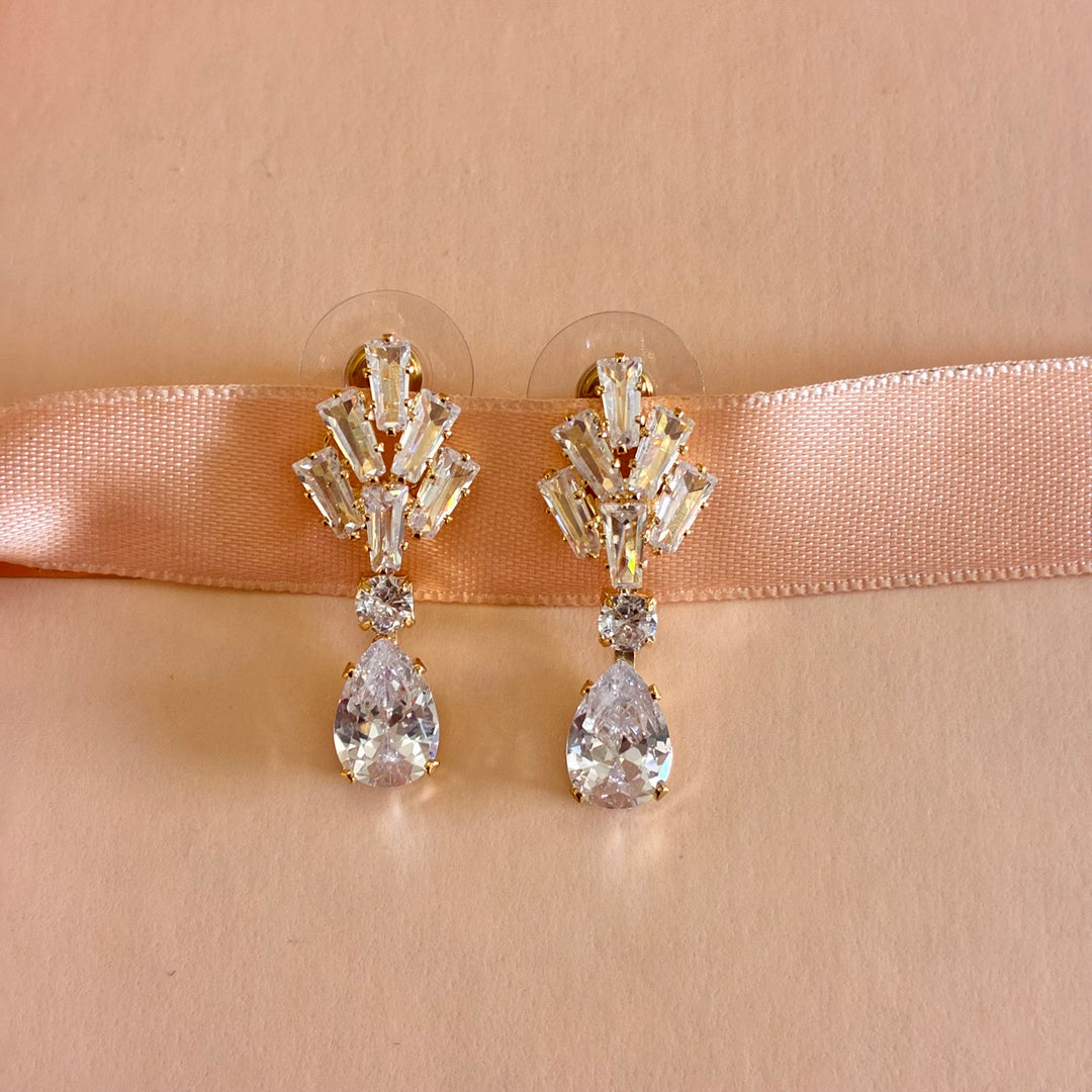 Baguette and teardrop zircone gold plated earrings