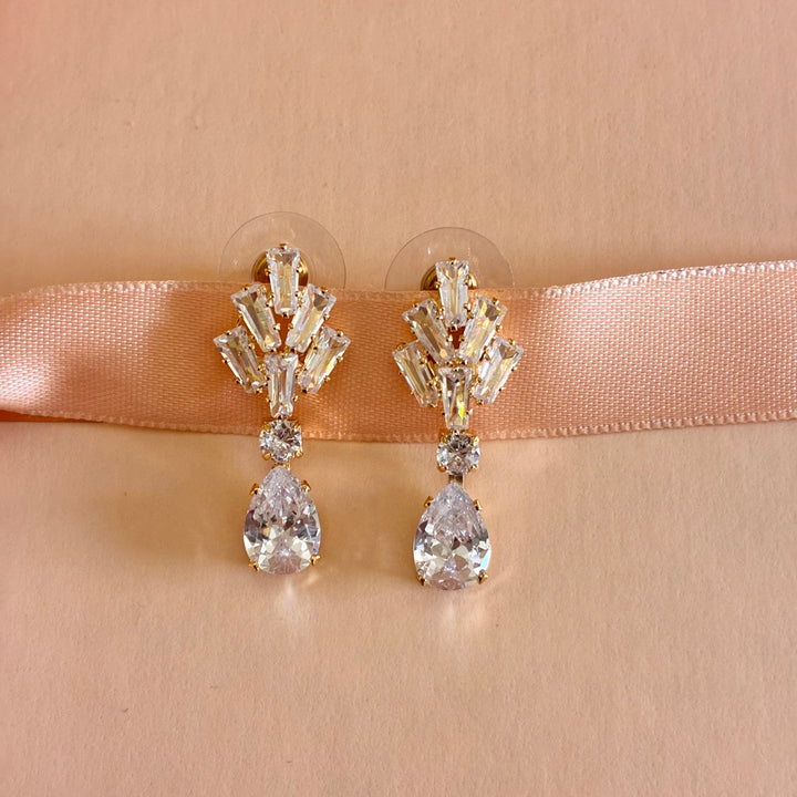 Baguette and teardrop zircone gold plated earrings