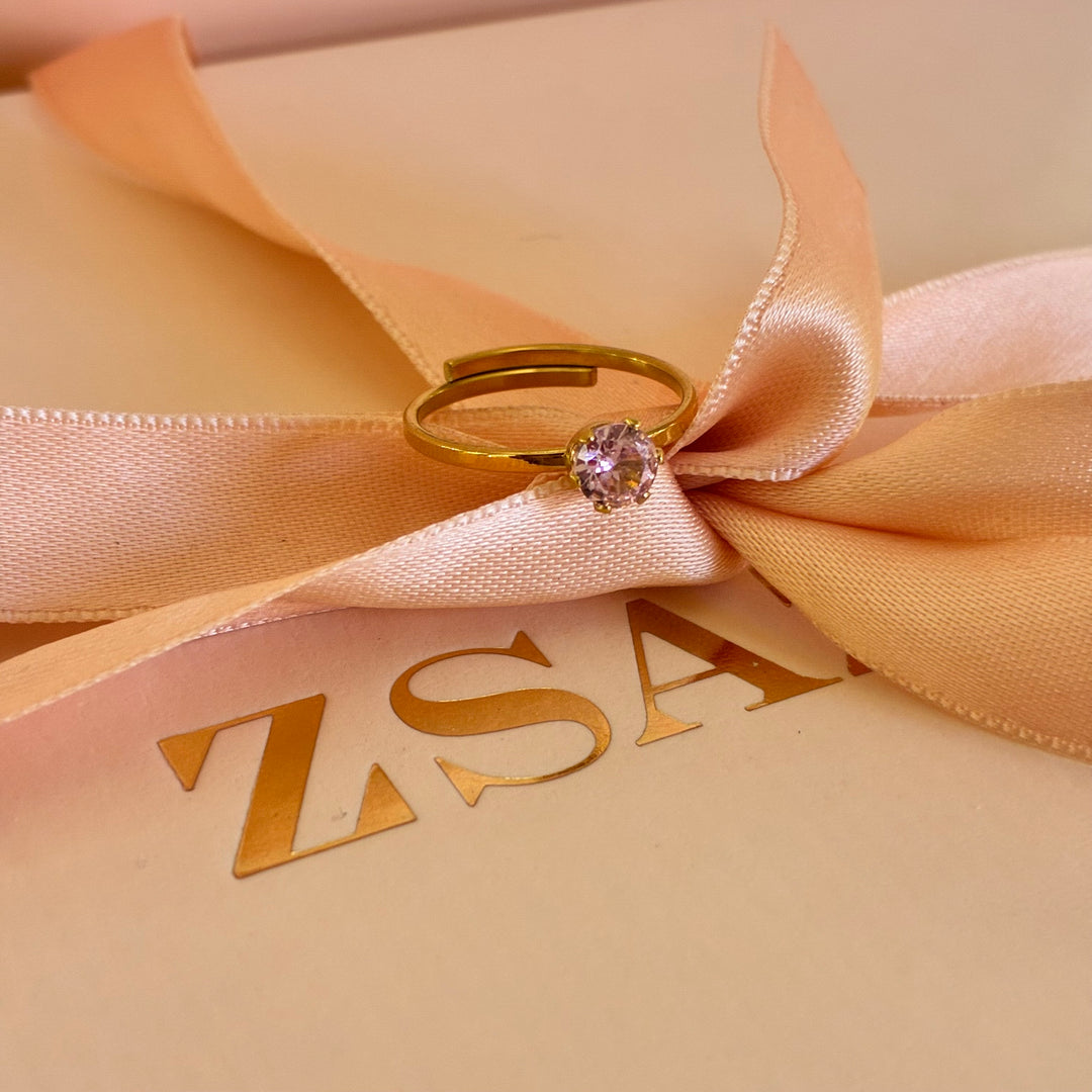 Solitaire light pink gold plated ring
