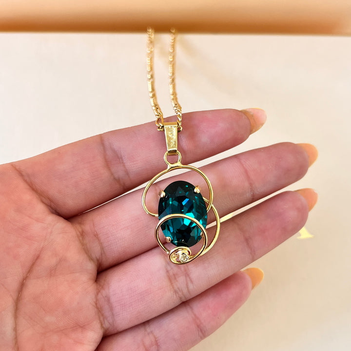 Dark green preciosa crystal twisted pendant