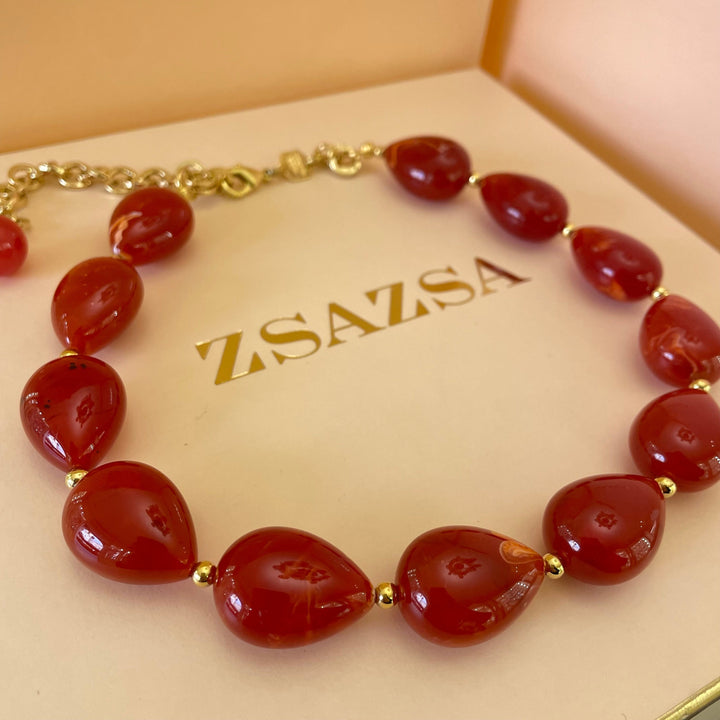 Statement red resin with champagne Swarovski crystals set