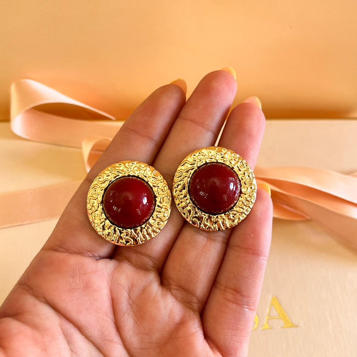 Dark red resin studs