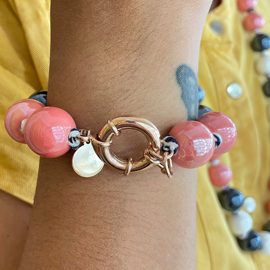 Coral and black ceramic knotted gold plated bracelet