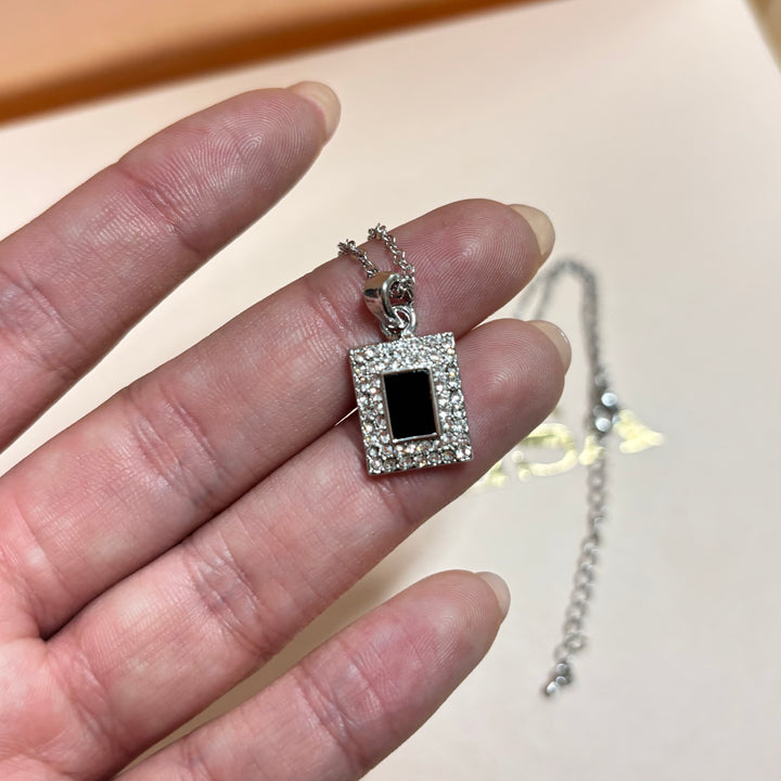 Dainty rectangular black rhinestone silver pendant