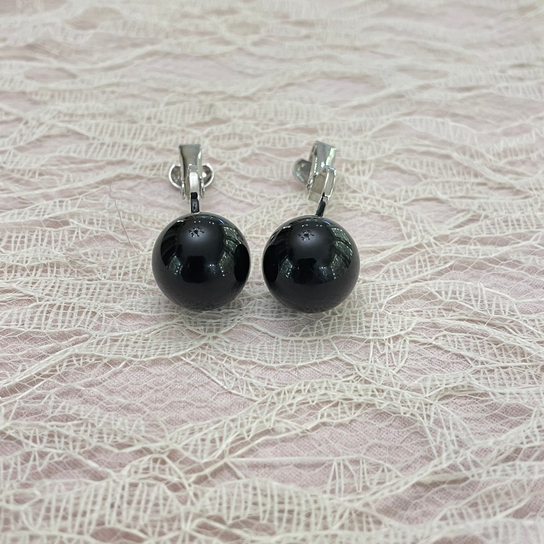 Black ball white gold clip on earrings