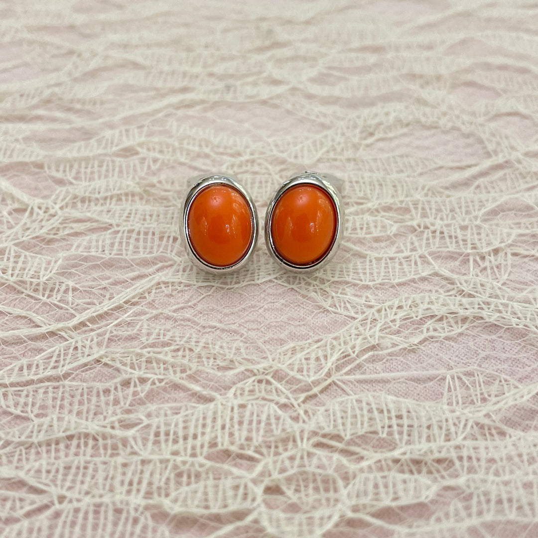 coral oval clips earrings
