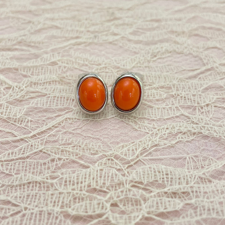 coral oval clips earrings