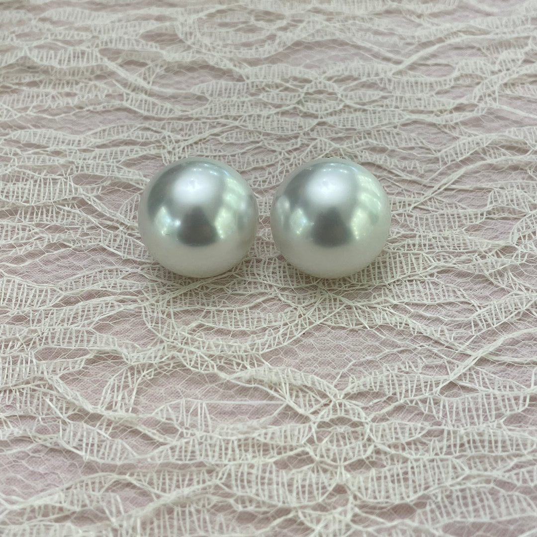 Half ball pearls silver clips earrings