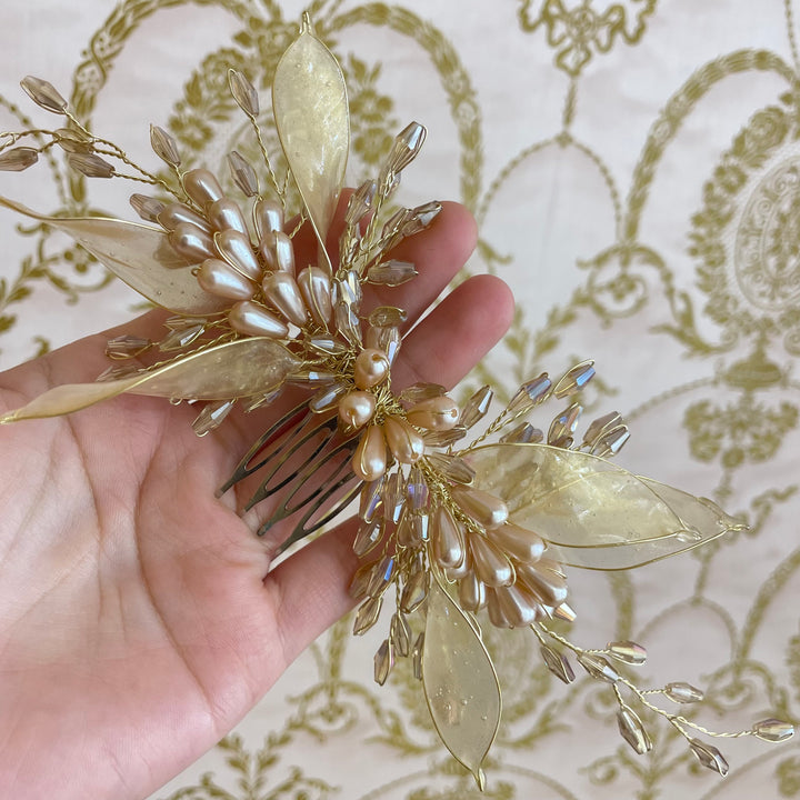 Long gold comb