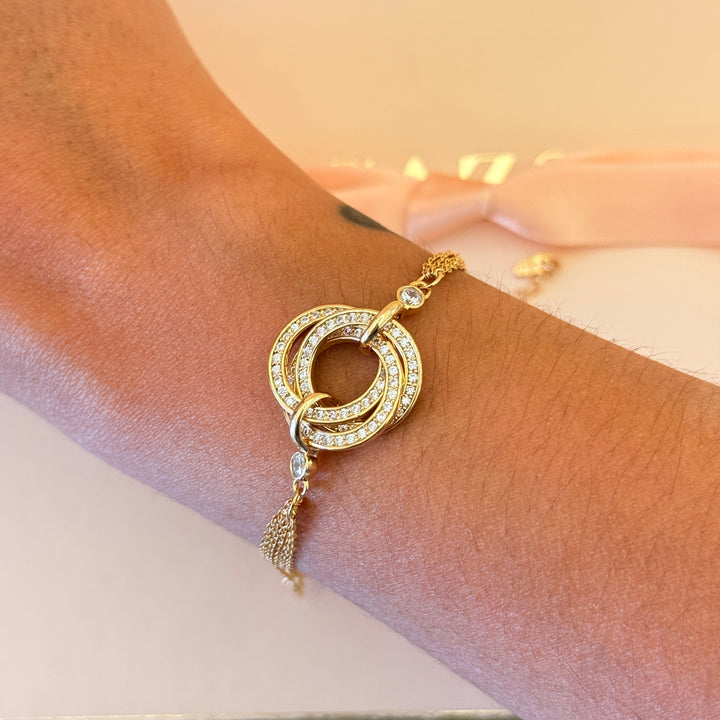 Zircone twisted round in the middle gold plated bracelet