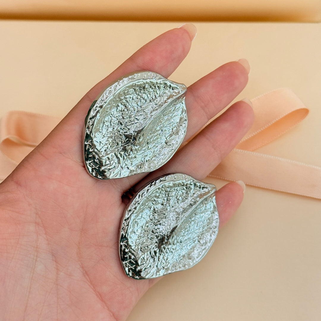 Plain texture leaf silver clip on earrings