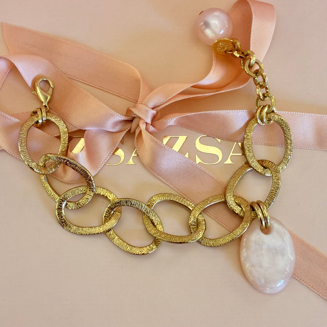 Gold plated light pink bracelet