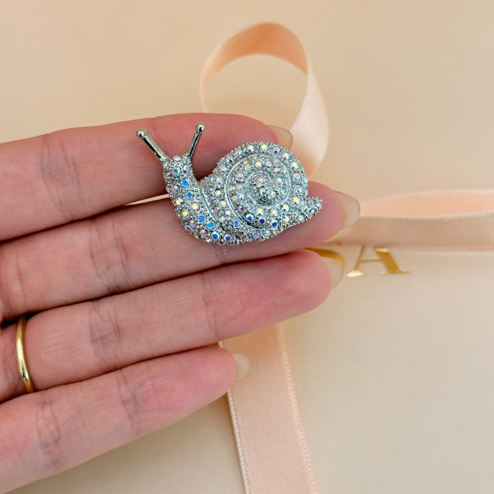 Aurora borealis snail rhinestone silver brooch