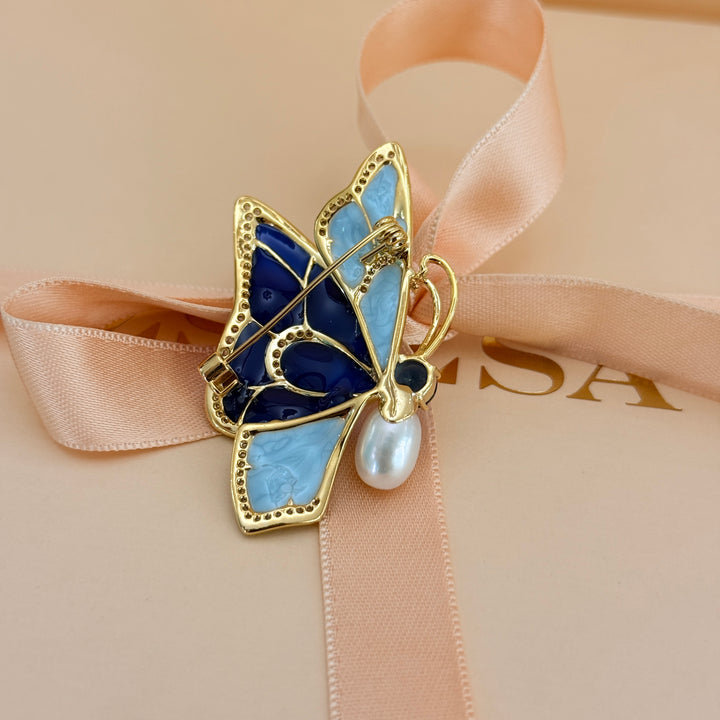 Blue enamel and zircone pearl gold plated brooch