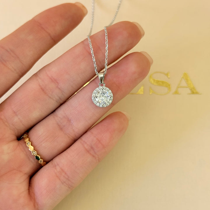 Dainty round sterling silver zircone pendant set
