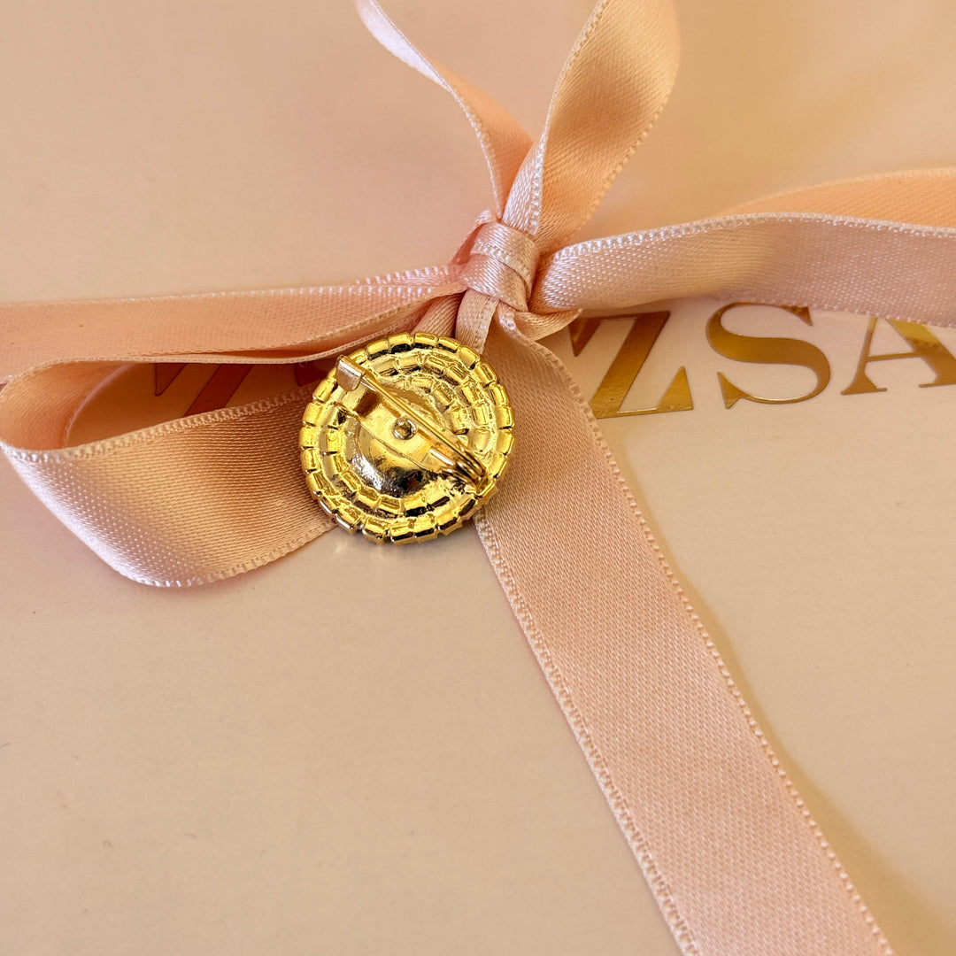 Round light green preciosa crystals gold plated brooch