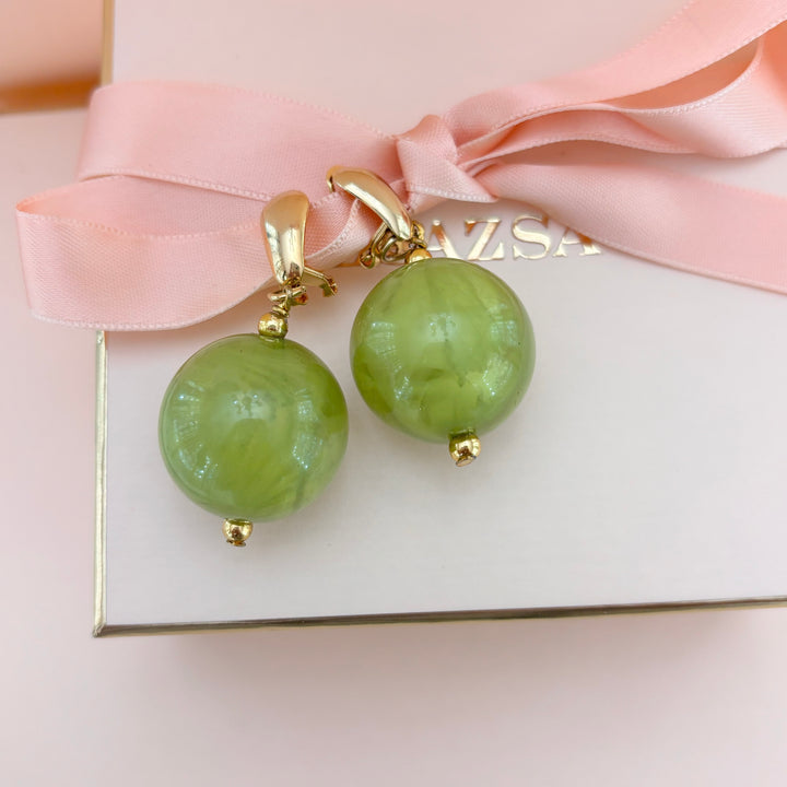 Green ball earrings