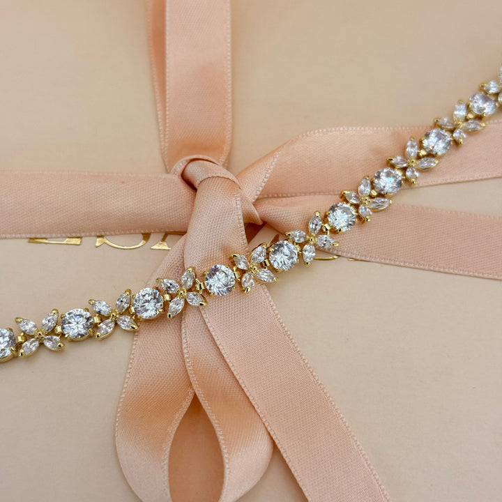 Round and marquise zircone gold plated earrings and bracelet