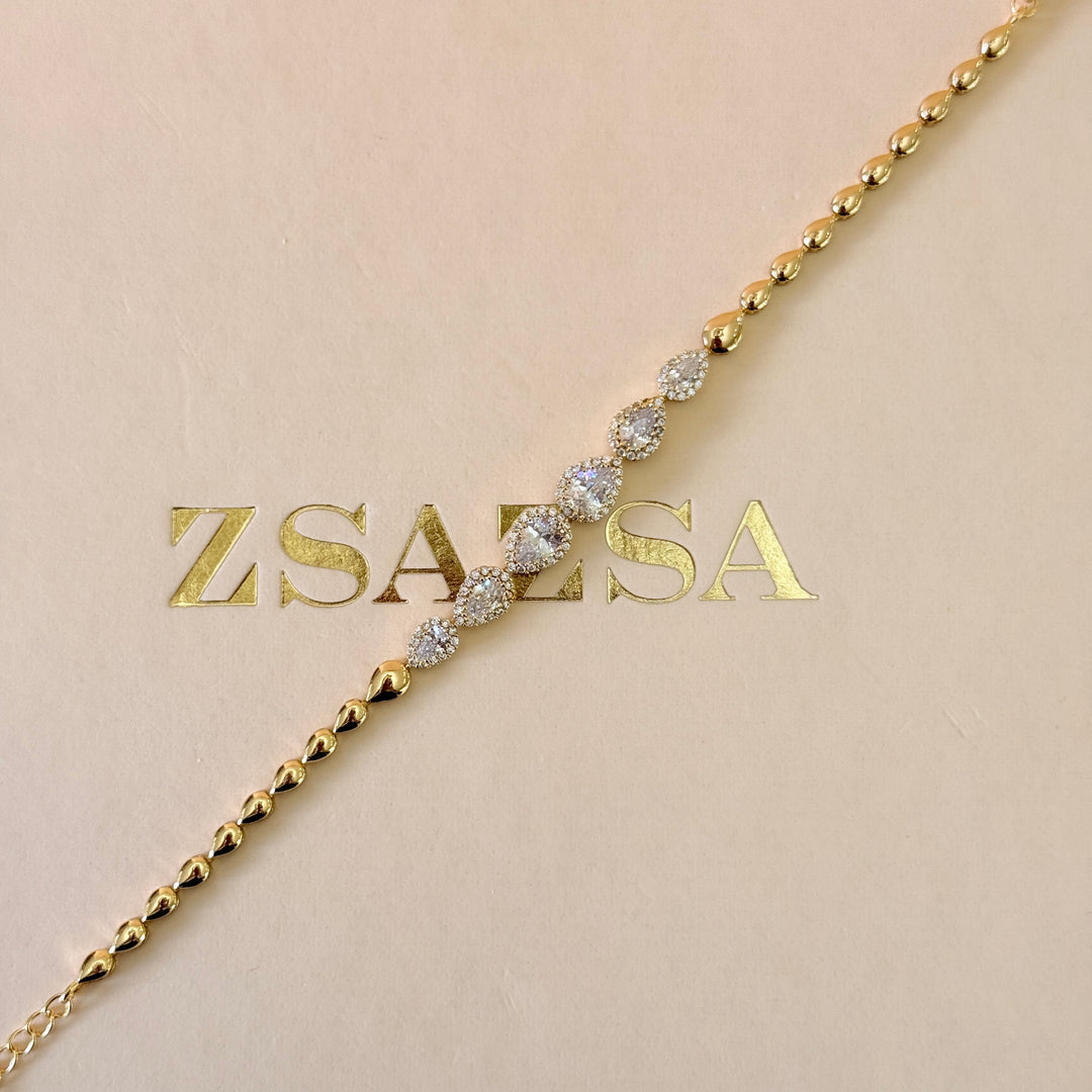 Teardrop zircone gold plated earrings and bracelet