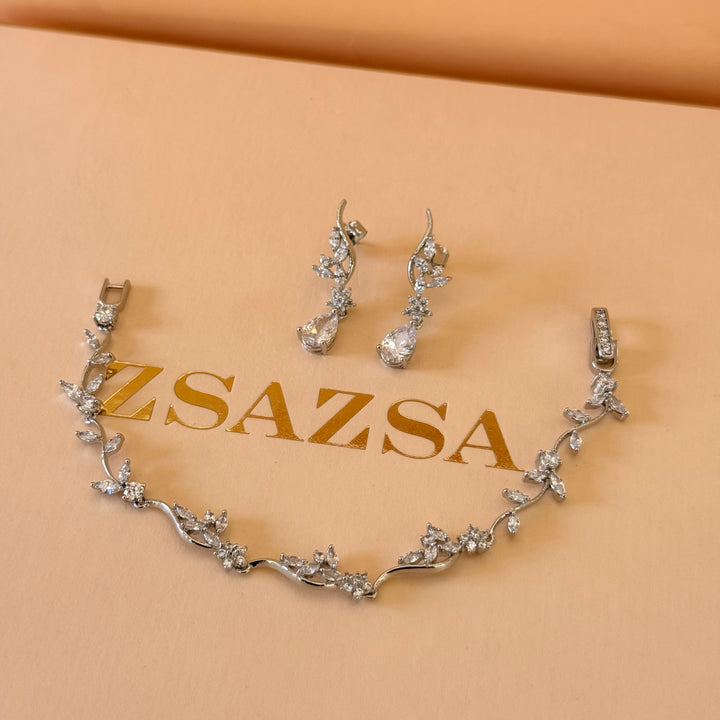 Teardrop and flower zircone silver earrings and bracelet